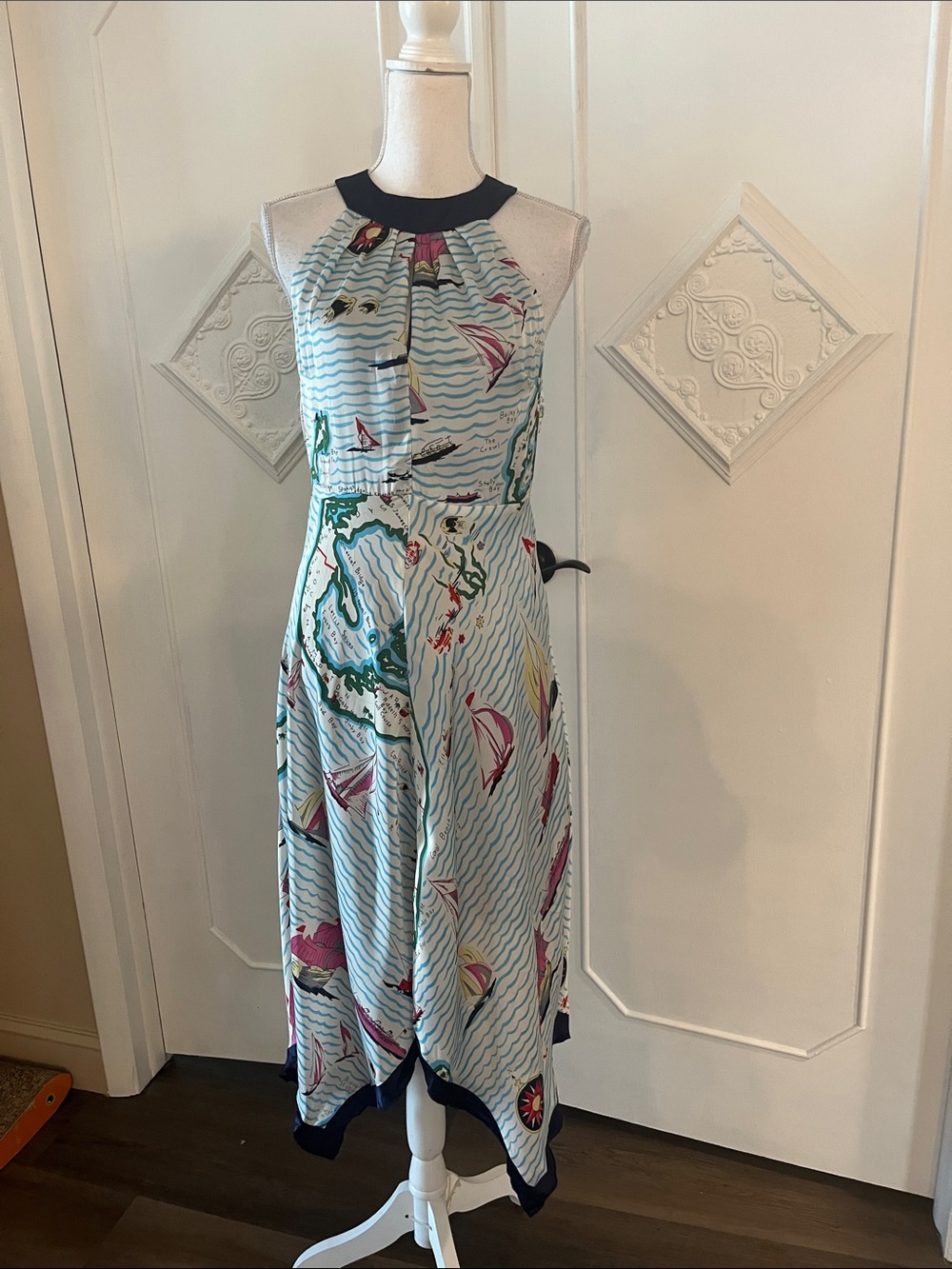 Eva Franco Sleeveless Handkerchief Hem Dress in Light Blue with Navy Trim